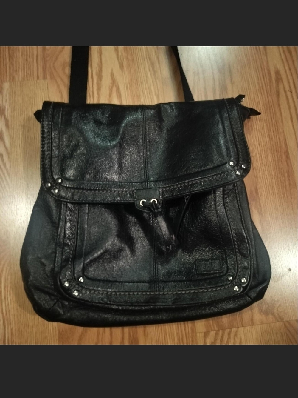 The Sak Black Leather Flap Crossbody Bag with Stud Accents